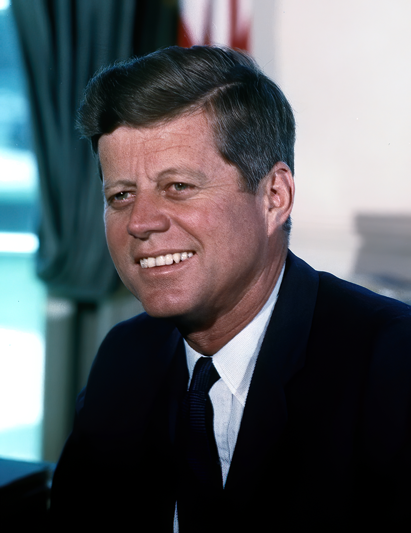 President John F. Kennedy in the Oval Office, July 1963; photograph by Cecil W. Stoughton.