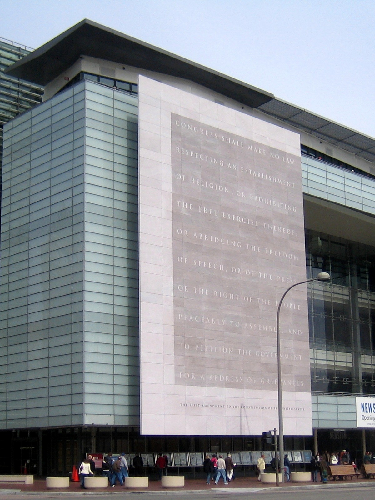 Newseum / press museum facade — media framing nest cover