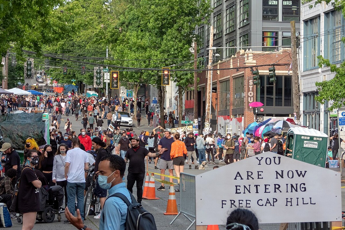 Entering Free Capitol Hill / CHOP signage