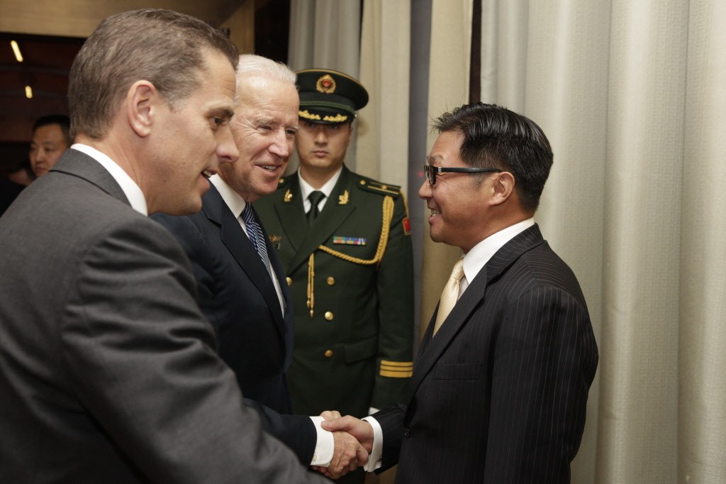 Hunter and Joe Biden meet Jonathan Li during the December 2013 China trip. The released photograph establishes a meeting, not an exchange of official favors.