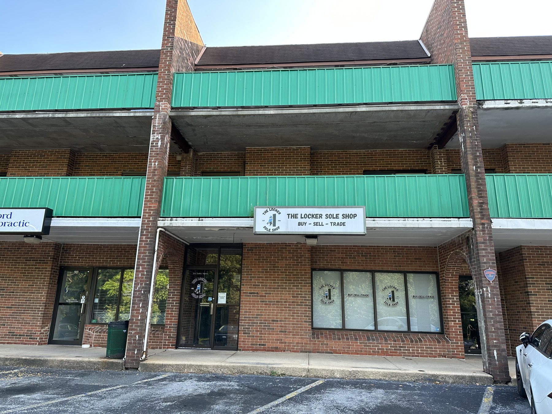The former Mac Shop location in Wilmington, photographed in July 2023 after another business occupied it; not a photograph from the 2019 handover.