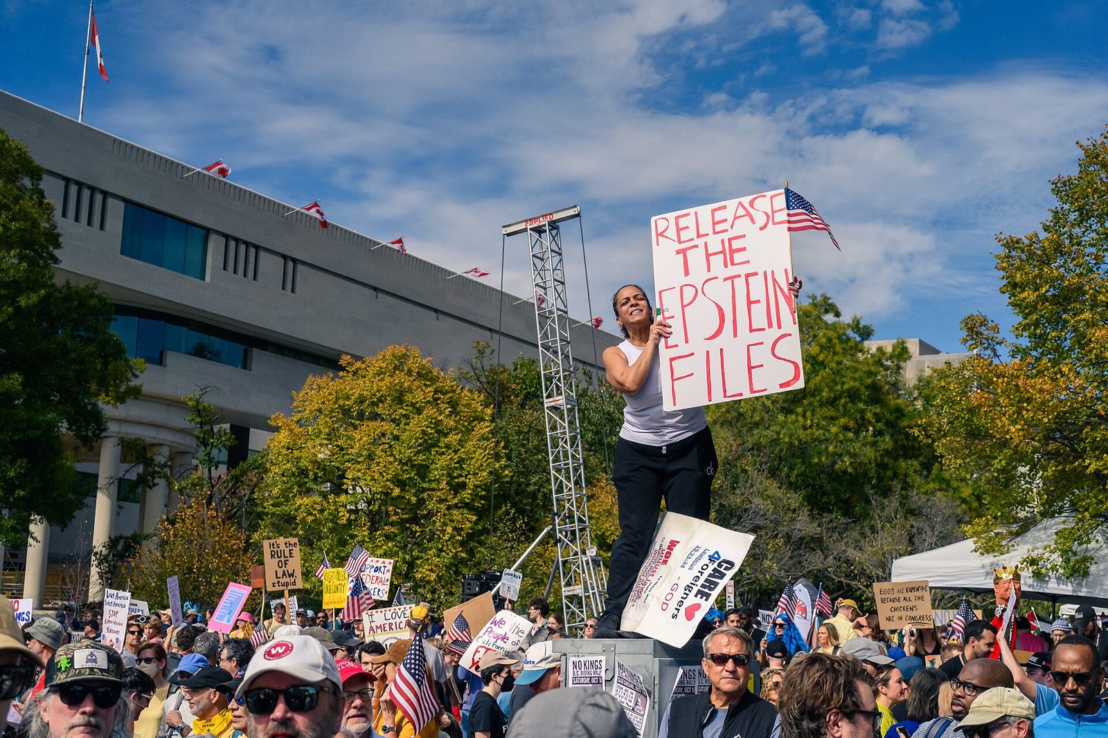 A protester holds a “Release the Epstein Files” sign at a rally in Washington, D.C., 18 October 2025.