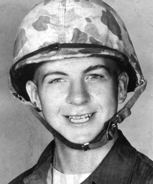 Lee Harvey Oswald in an official U.S. Marine Corps portrait, 1956.