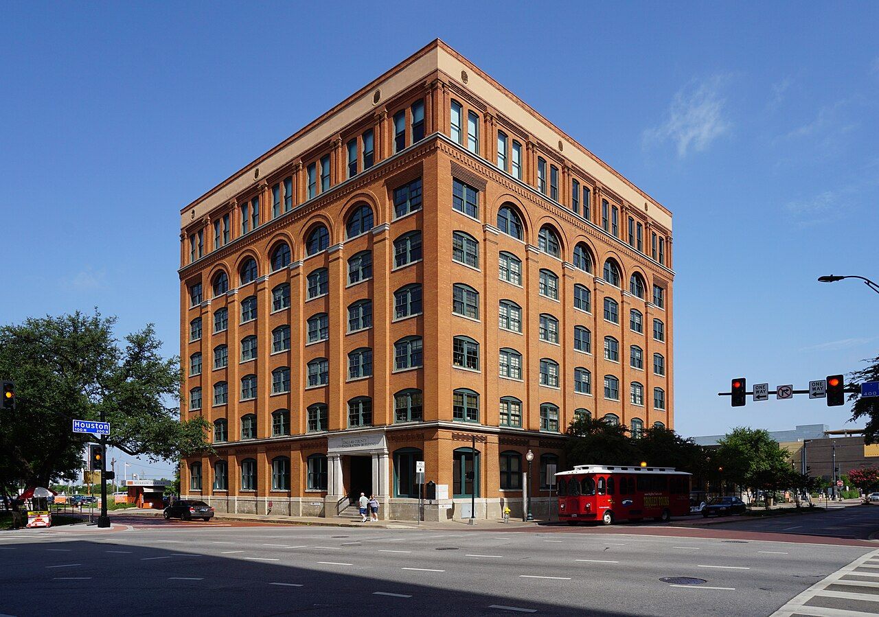 The former Texas School Book Depository, July 2015. Later architectural context.