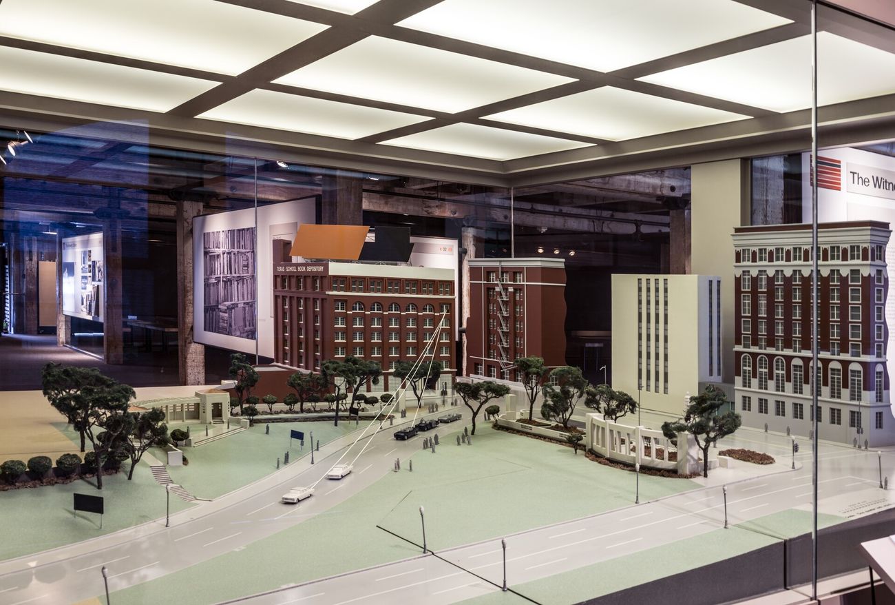 Inside the Sixth Floor Museum: a model of Dealey Plaza beside the corner where the Commission said Oswald fired.