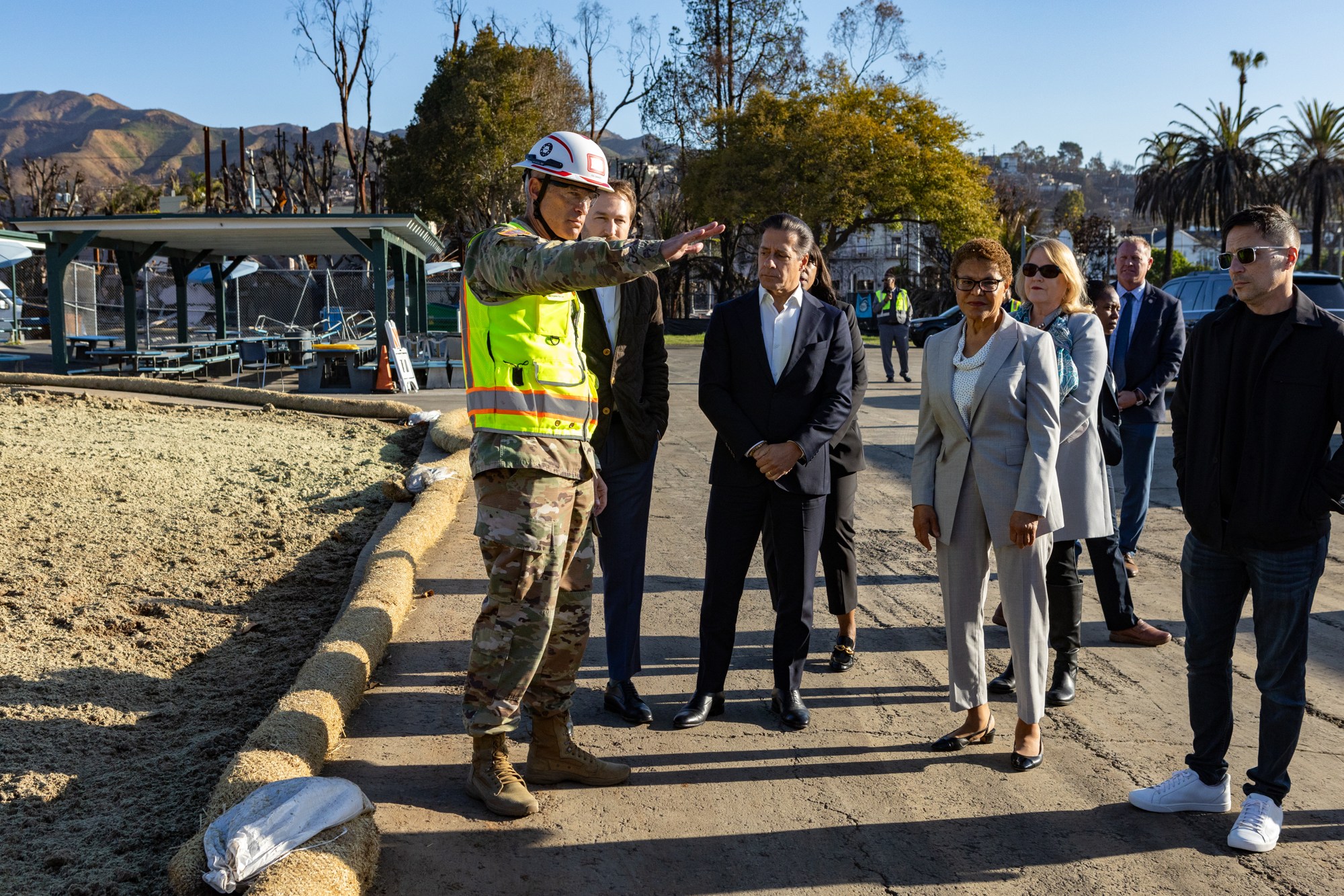 Bass and other officials visit Palisades Elementary Charter School with U.S. Army Corps of Engineers Col. Brian D. Sawser, April 4, 2025.