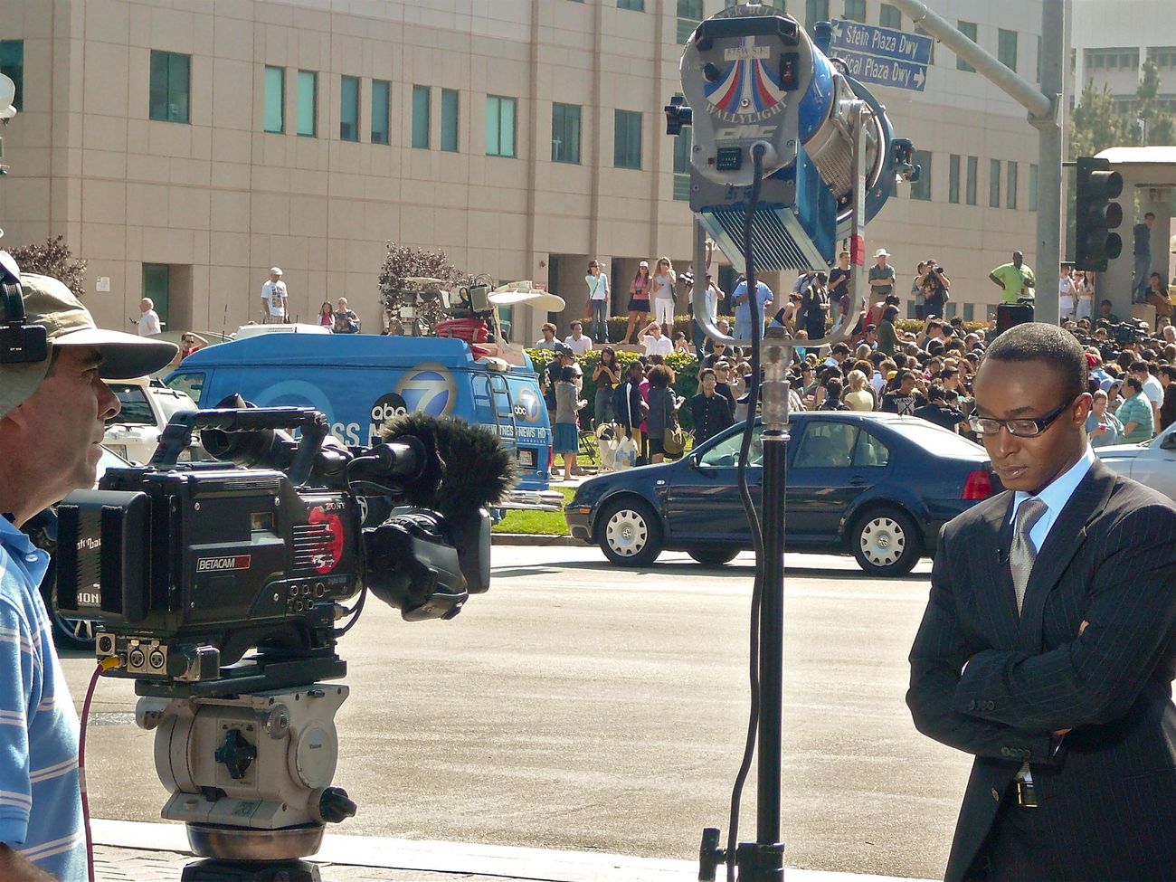A reporter and crowd outside UCLA on June 25, 2009.
