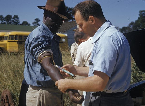 A man has blood drawn during the U.S. Public Health Service’s Tuskegee syphilis study, another government study that ran for decades without informed consent.