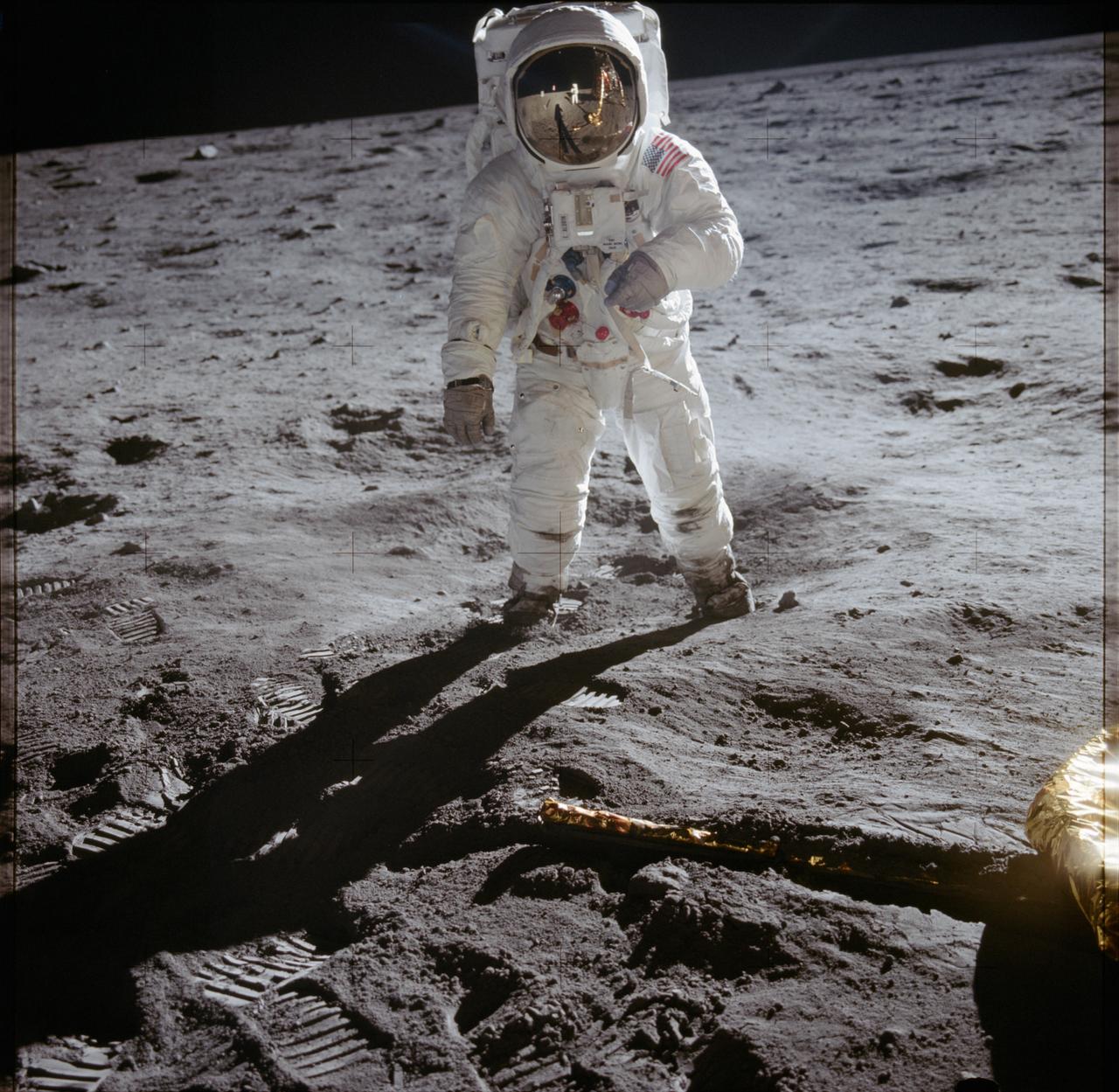 Topic photograph: Astronaut Edwin E. Aldrin Jr., lunar module pilot, walks on the surface of the moon near the leg of the Lunar Module (LM) "Eagle" during the Apollo 11 extravehicular activity (EVA). Astronaut Neil A. Armstrong, commander, took this photograph with a 70mm lunar surface camera. While astronauts Armstrong and Aldrin descended in the Lunar Module (LM) "Eagle" to explore the Sea of Tranquility region of the moon, astronaut Michael Collins, command module pilot, remained with the Command and Service Modules (CSM) "Columbia" in lunar orbit.