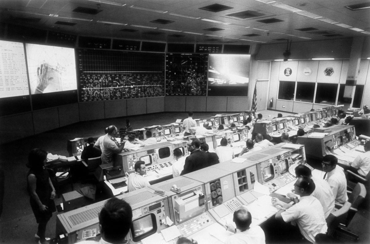 Overall view of the Mission Operations Control Room in the Mission Control Center, bldg 30, during the lunar surface extravehicular activity (EVA) of Apollo 11 Astronauts Neil A. Armstrong and Edwin E. Aldrin Jr.