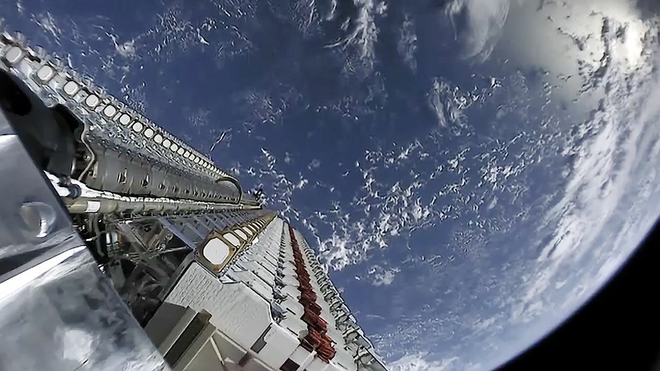 Starlink satellites before deployment on SpaceX’s May 2019 mission.