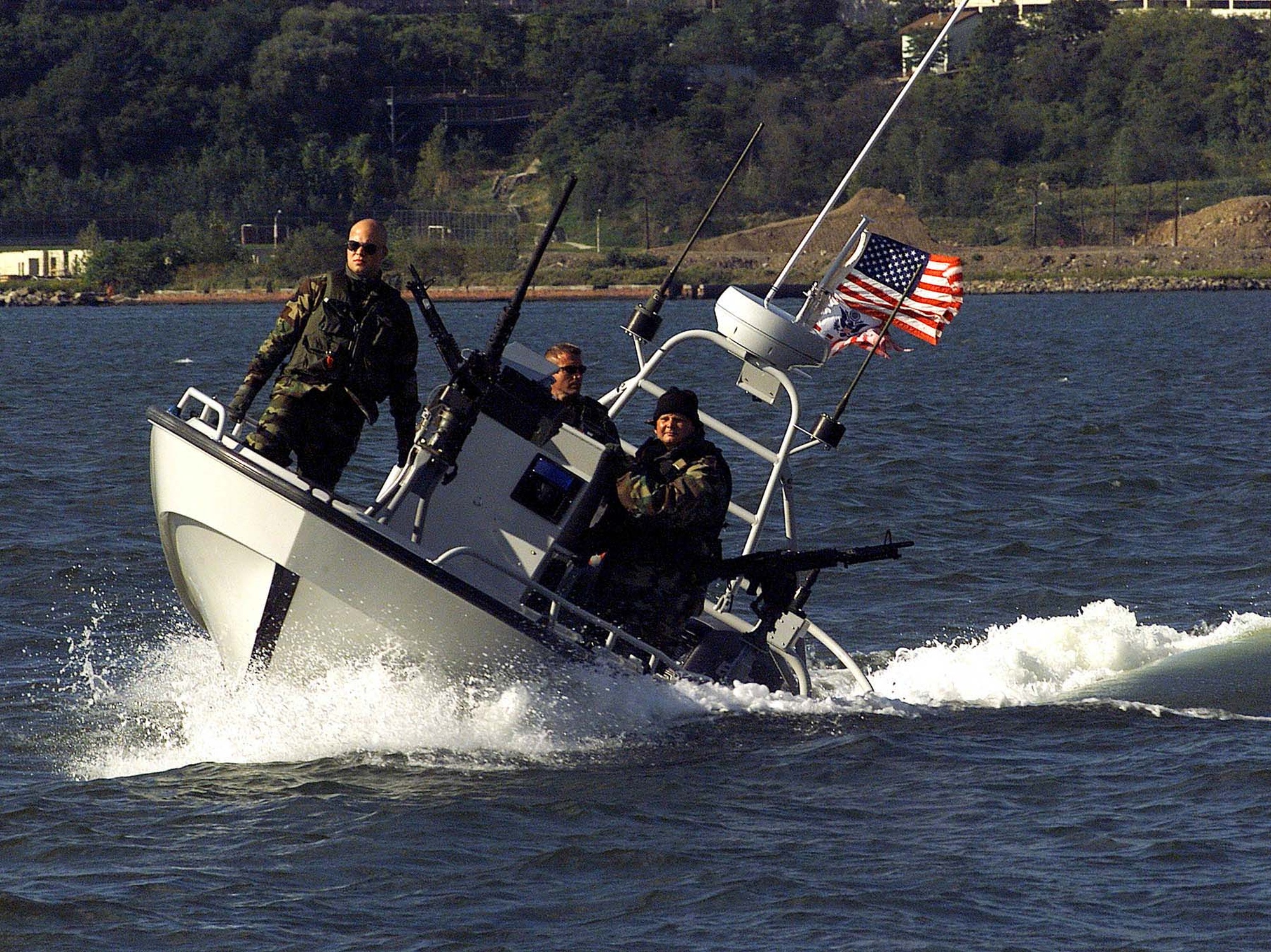 A Coast Guard port-security crew patrols the Hudson River in the weeks after the attacks. Archive date fields reflect later publication; the source caption identifies the scene.