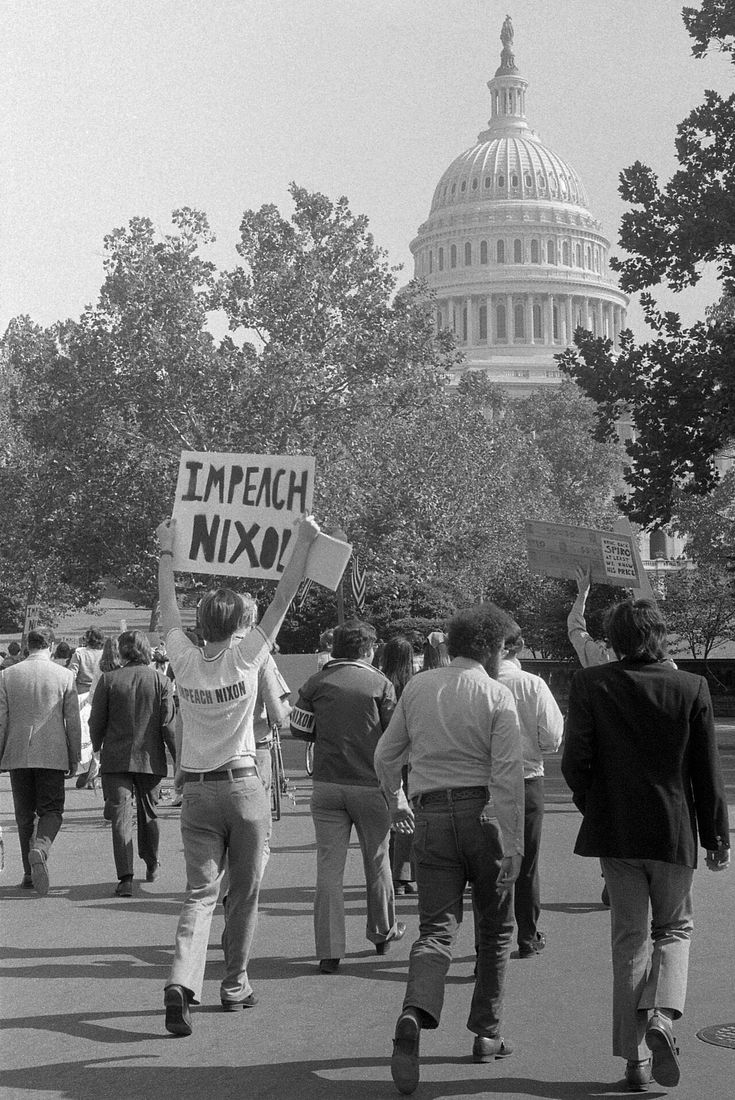Demonstrators with an “Impeach Nixon” sign in Washington, 22 October 1973, two days after the Saturday Night Massacre.